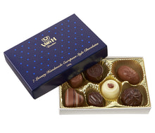 Box of chocolates with a blue lid featuring Van H brand name on a white background